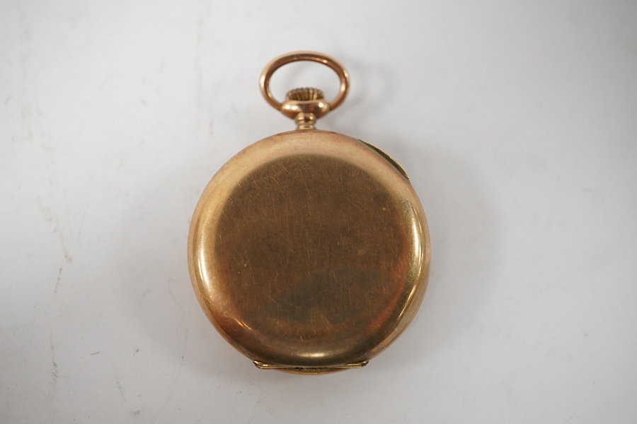 A George V 9ct gold open faced fob watch, with Roman dial and subsidiary seconds(hand loose), with 9ct gold cuvette, case diameter 34mm, gross weight 27.2 grams. Condition - poor to fair